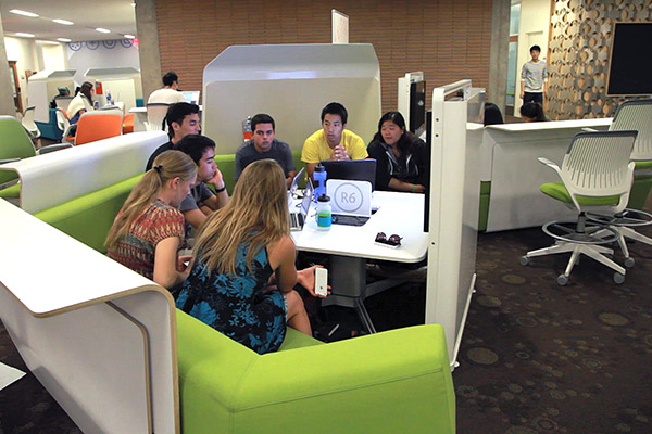 A team of students in the IoES senior capstone practicum course work on their research projects at UCLA's Young Research Library. Photo by John Vande Wege.
