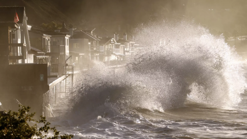 Waves crash into a seawall at Mondo’s Beach in Ventura County in January 2016 during an El Niño storm. (LA Times)