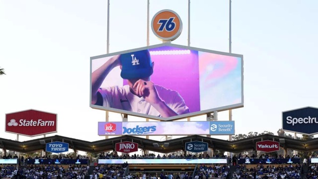 The 76 logo sits above the left field scoreboard at Dodger Stadium.