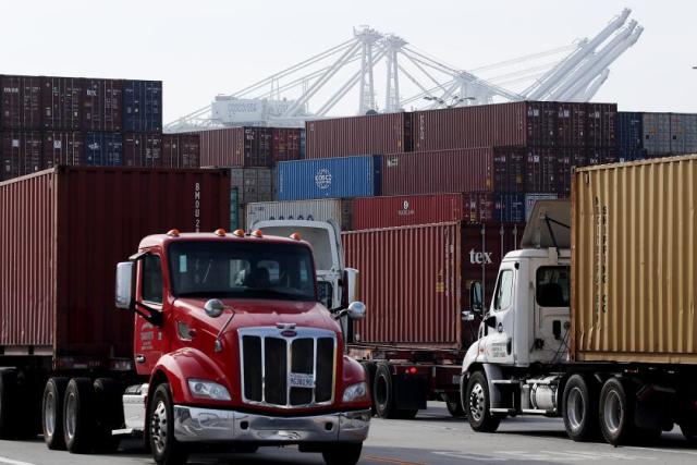 California is waiting for the EPA approve a rule that would hasten the electrification of cargo trucks at seaports. Meanwhile, diesel-powered big rigs continue to be granted access to the ports of Los Angeles and Long Beach, seen here.