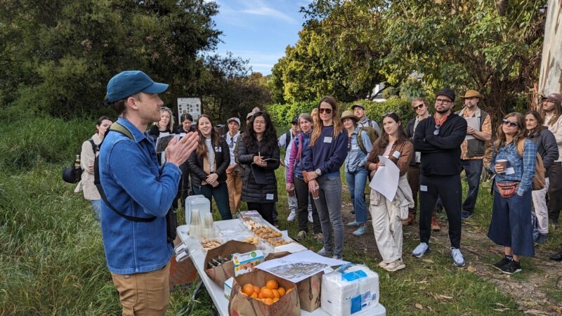 Andy Kleinhesselink (left) prepares to give students a tour of Sage Hill at UCLA