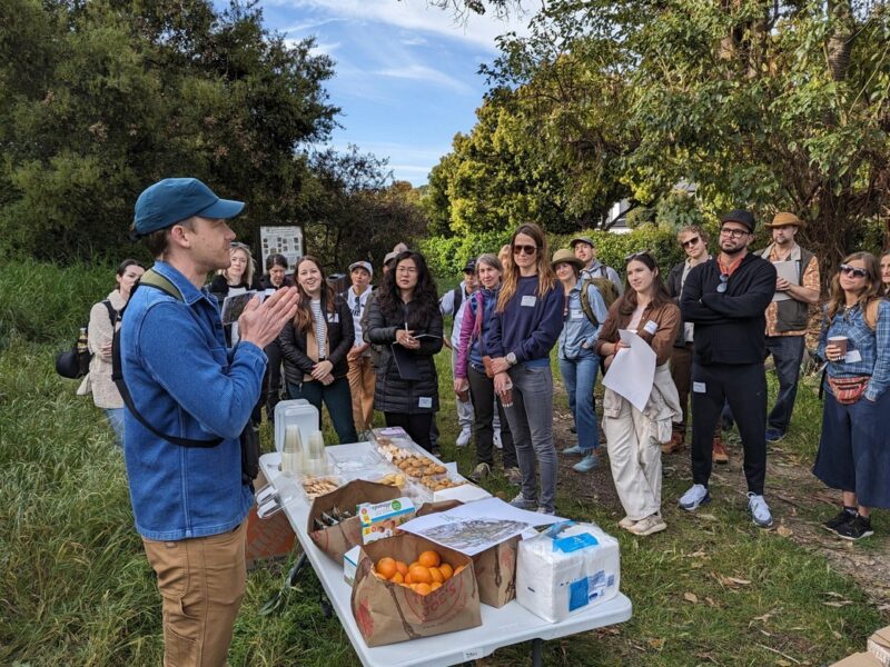 Andy Kleinhesselink (left) prepares to give students a tour of Sage Hill at UCLA