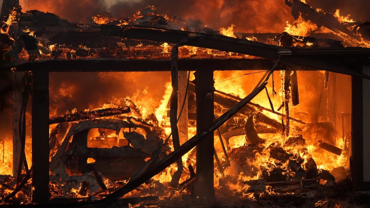 A home burns in the Mountain Fire, Nov. 6 2024, in Camarillo, Calif.